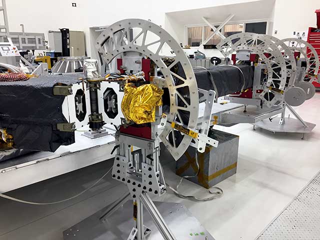 NISAR's upper antenna boom assembly being prepared for spacecraft integration at NASA's Jet Propulsion Laboratory.
