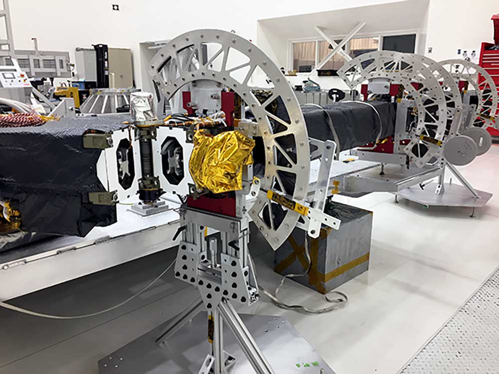 The upper antenna boom, with the hinge visible, in the clean room.